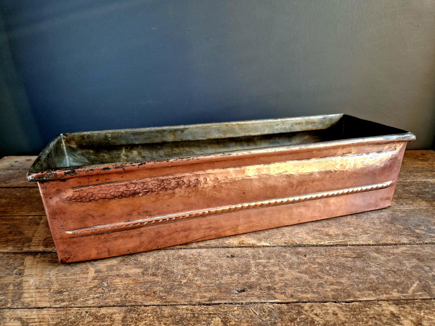 French antique copper planter in a rectangular form.