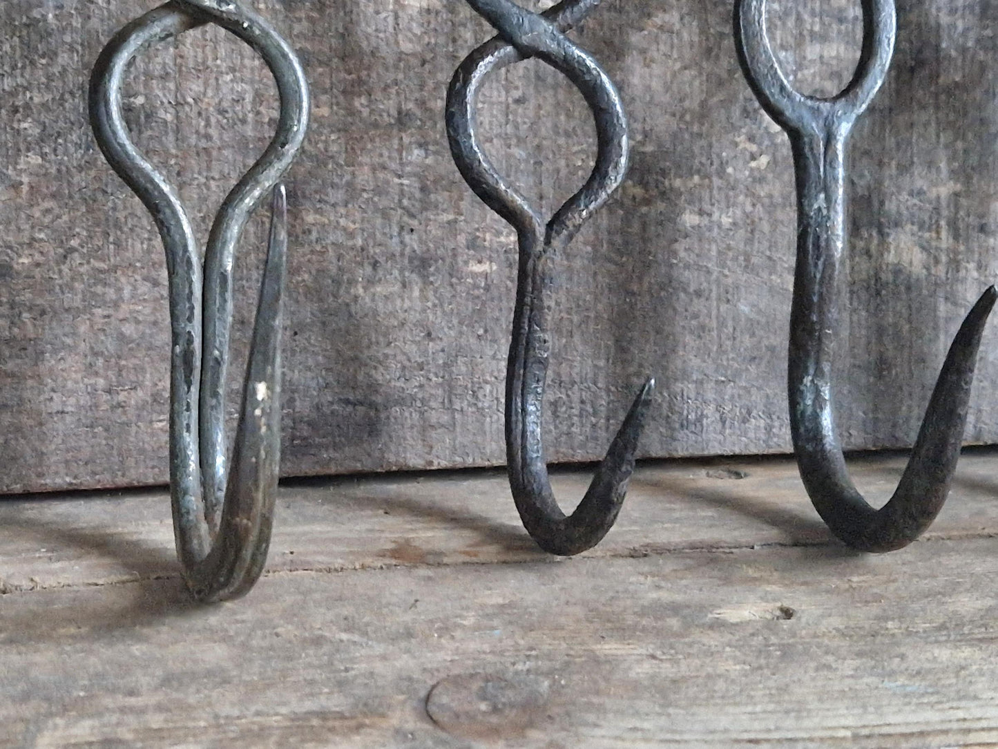 Four old French charcuterie hooks. Antique meat hooks for kitchen decor.