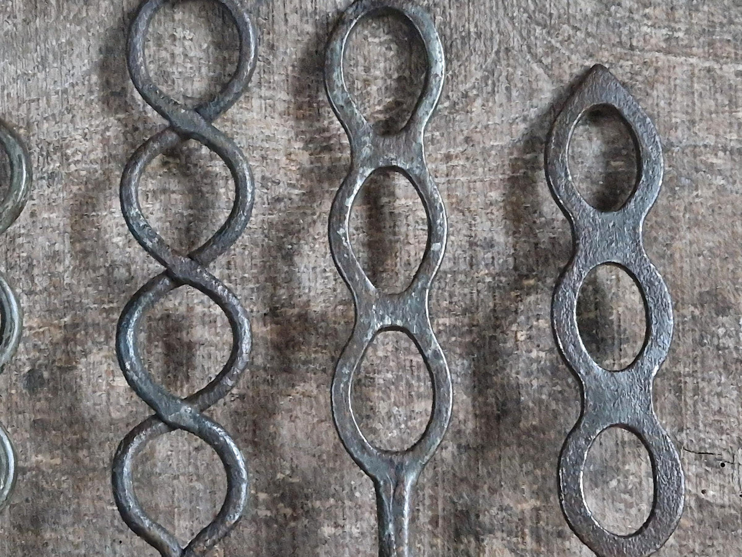 Four old French charcuterie hooks. Antique meat hooks for kitchen decor.