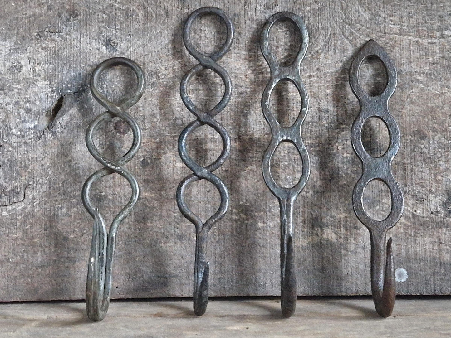 Four old French charcuterie hooks. Antique meat hooks for kitchen decor.