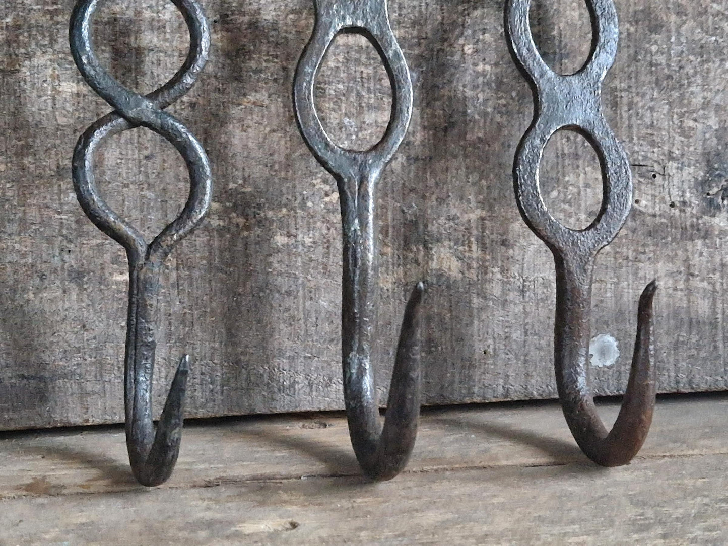 Four old French charcuterie hooks. Antique meat hooks for kitchen decor.