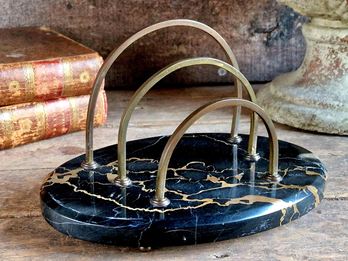 French antique letter rack with black marble base.
