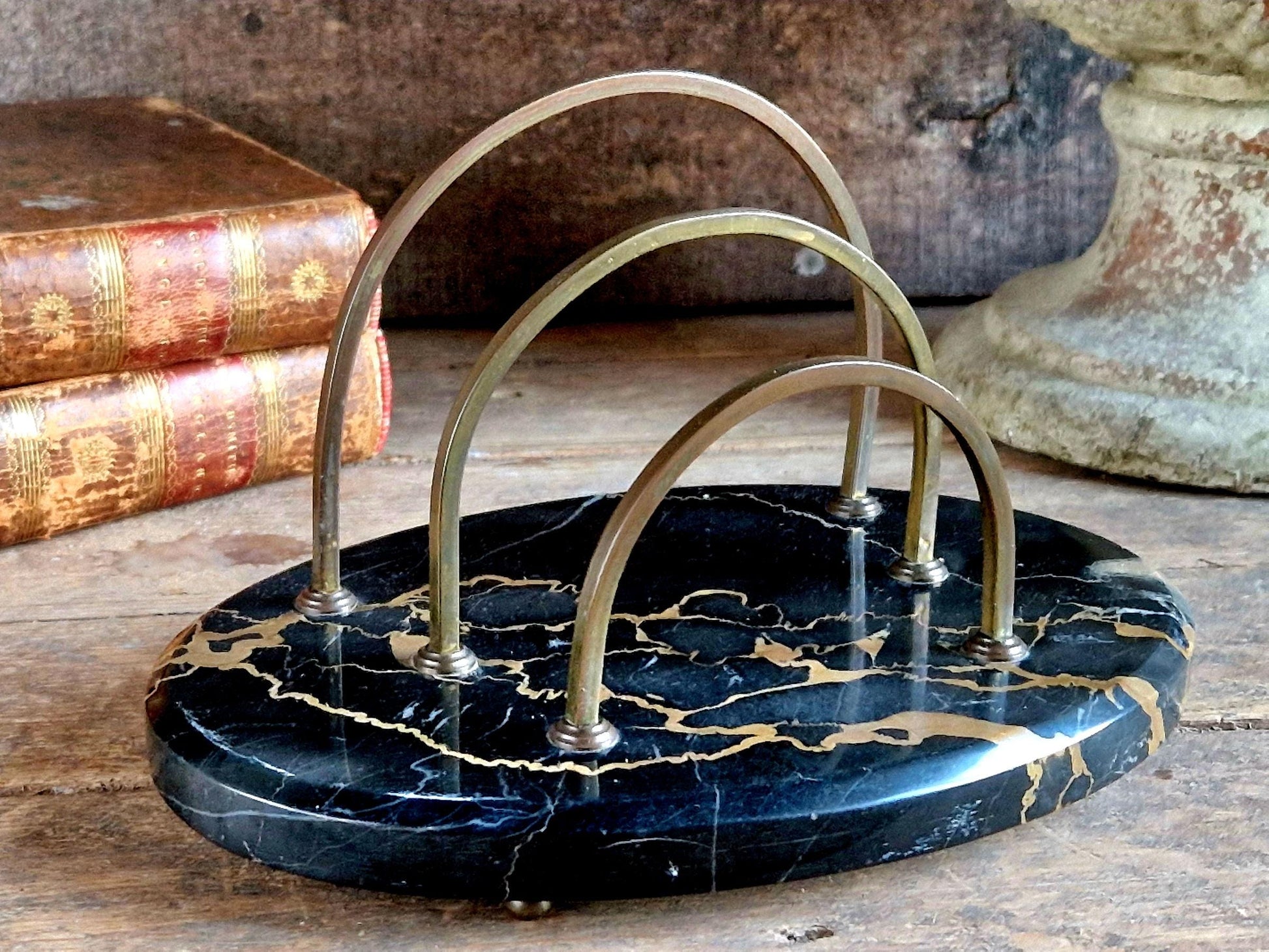 French antique letter rack with black marble base.