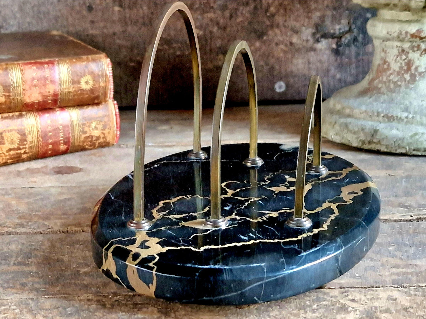 Antique letter rack with black marble base. Art Deco period letter holder.