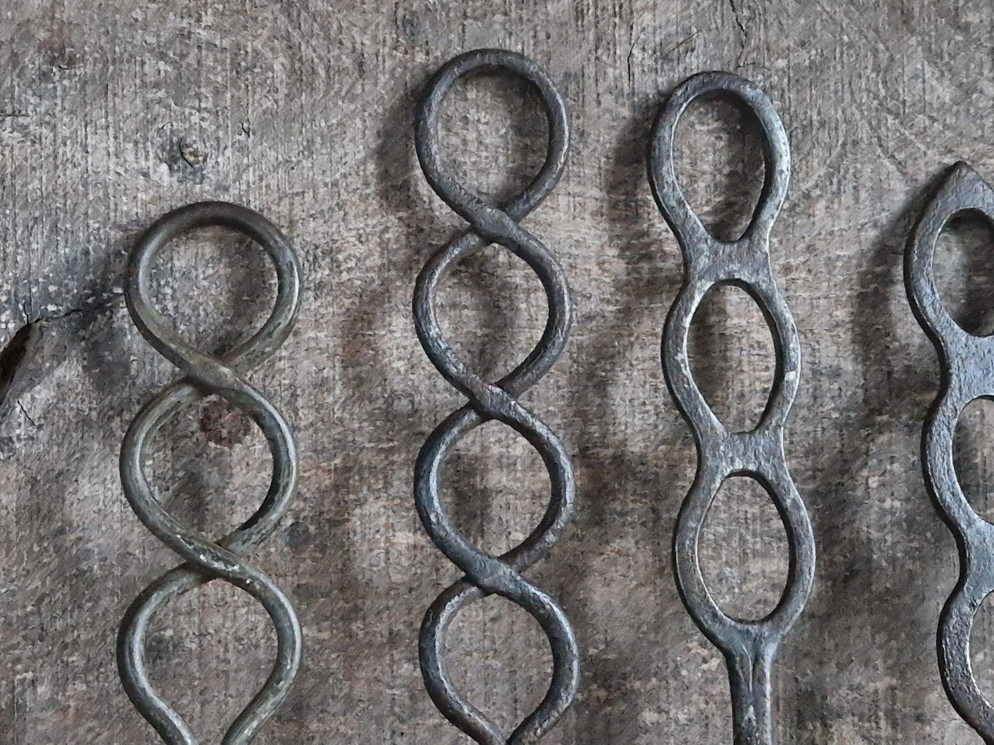 Four old French charcuterie hooks. Antique meat hooks for kitchen decor.