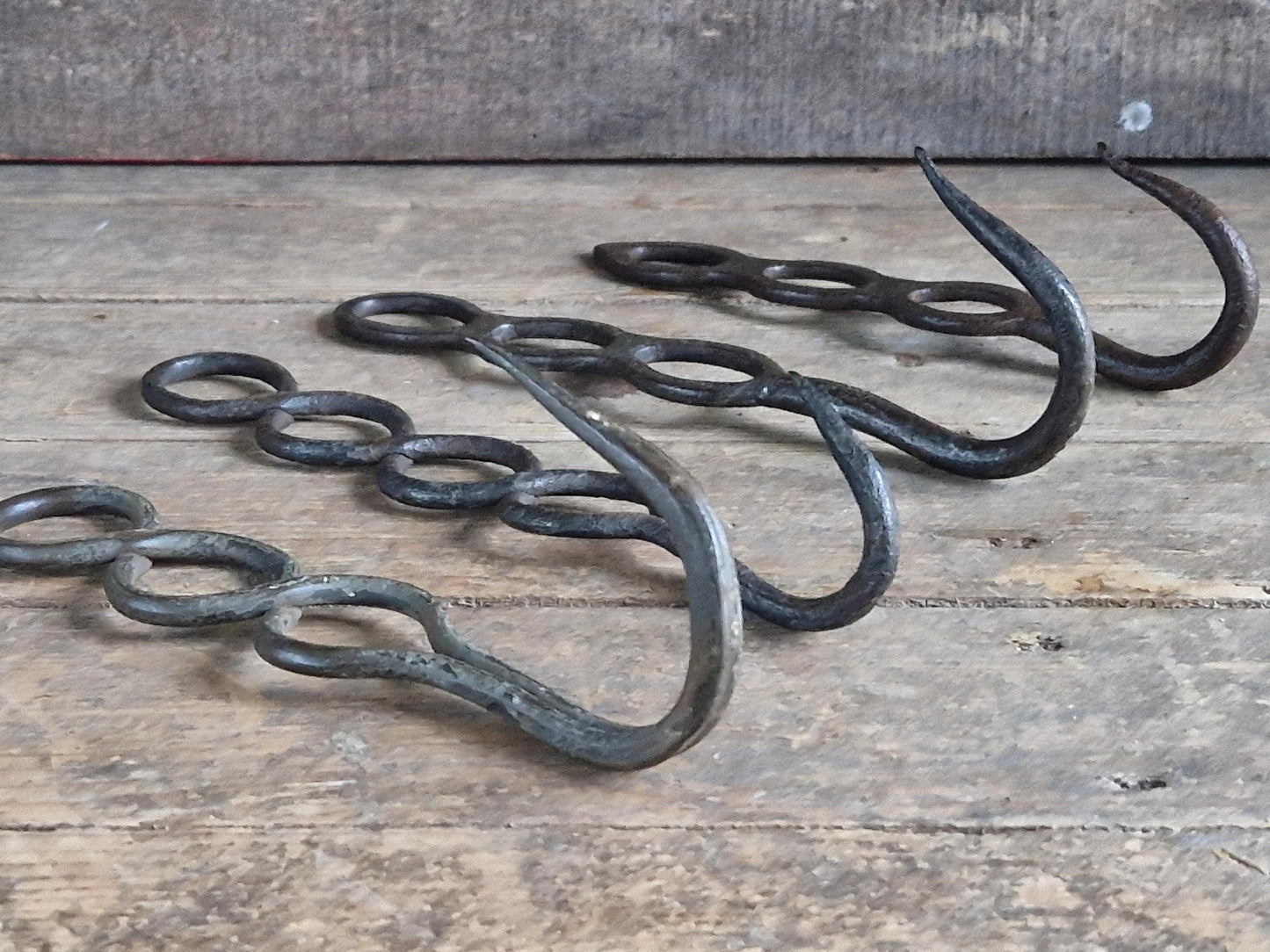 Four old French charcuterie hooks. Antique meat hooks for kitchen decor.