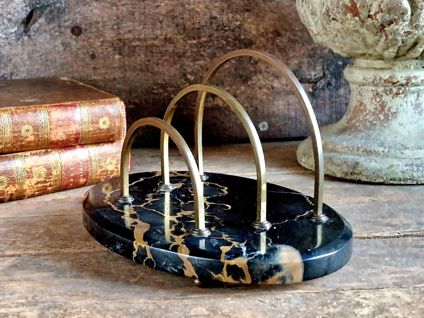 Antique letter rack with black marble base. Art Deco period letter holder.